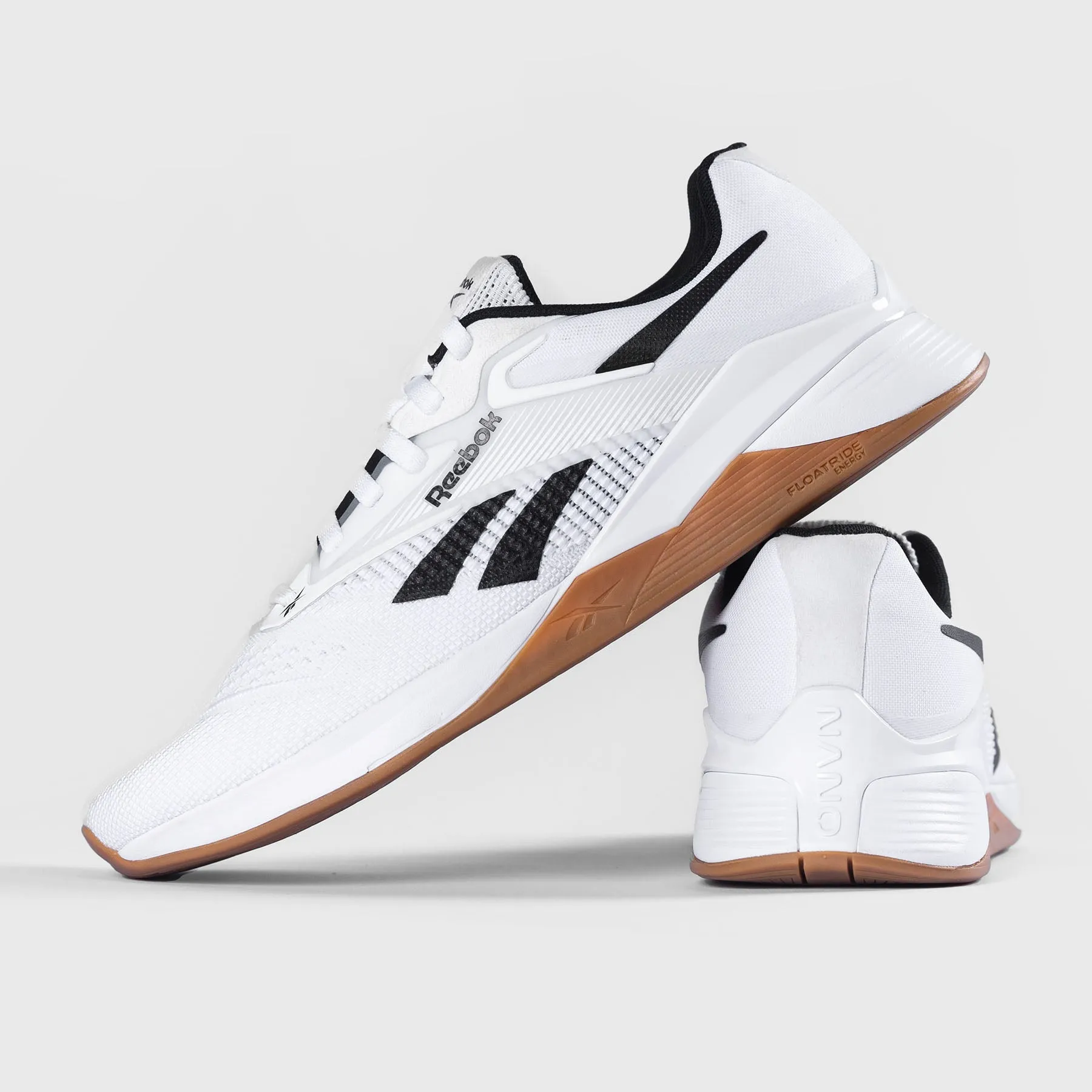 Sure! Heres an optimized title for the product:

Reebok Nano X4 Cross-Training Shoes - White/Black/Gum - High-Performance Sports Footwear