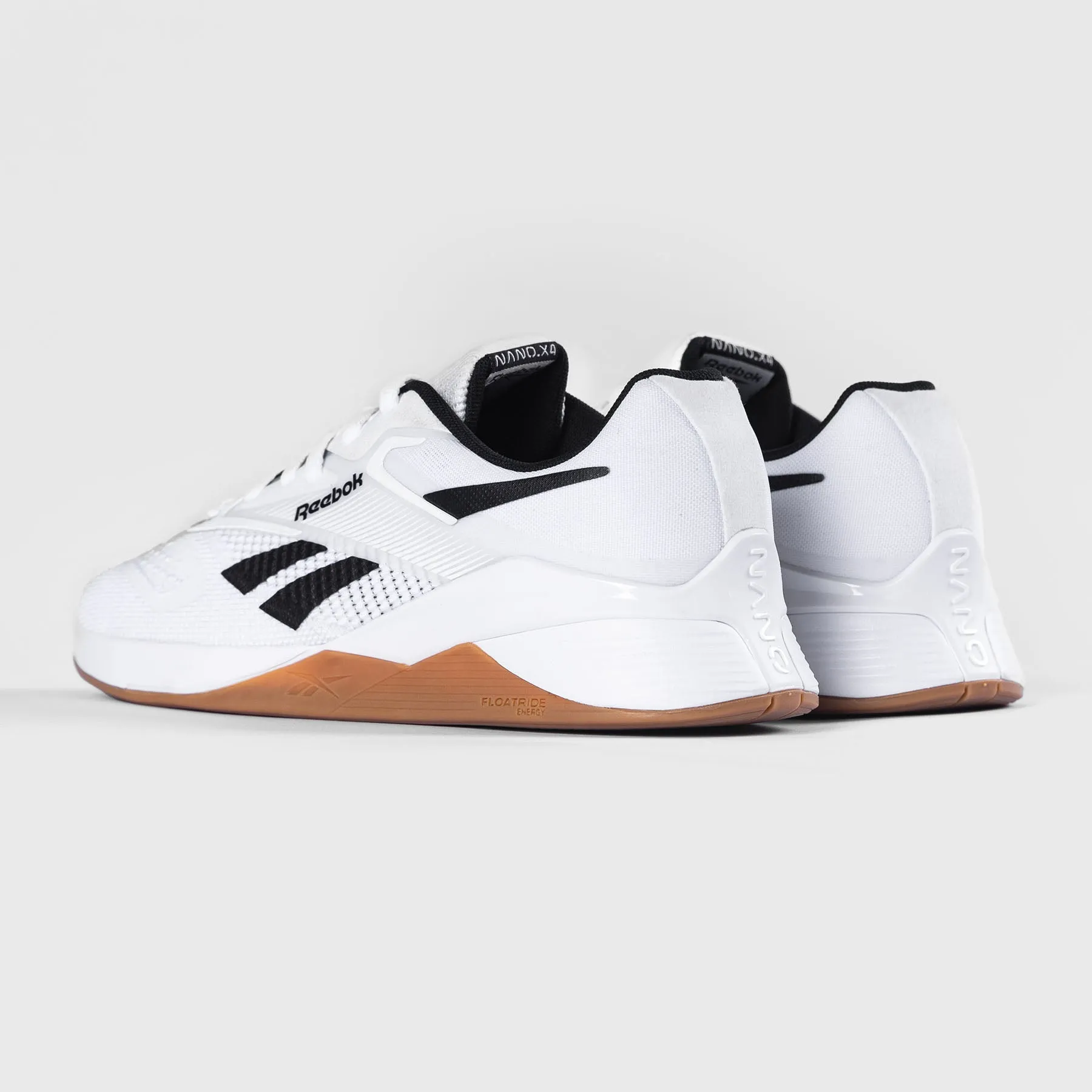 Sure! Heres an optimized title for the product:

Reebok Nano X4 Cross-Training Shoes - White/Black/Gum - High-Performance Sports Footwear